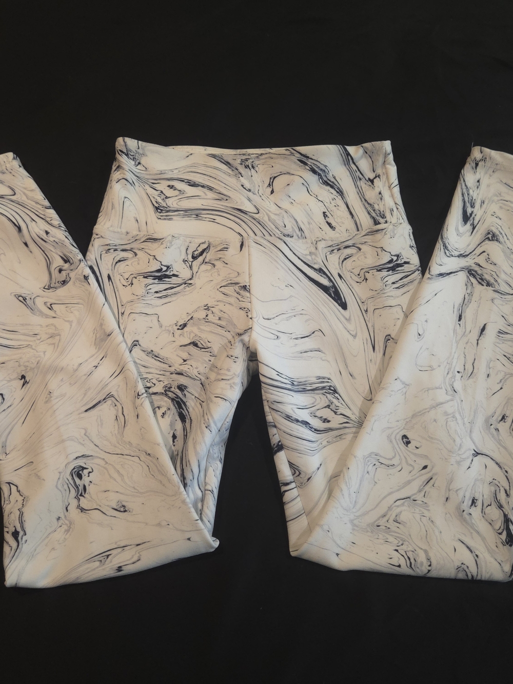 Balance Collection Marble-Print Leggings in White and Black.